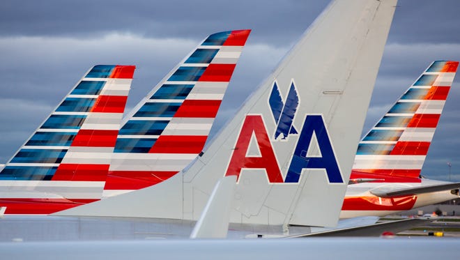 American Airlines tails line up at Terminal 3 at Chicago O'Hare International Airport on Nov. 11, 2016.