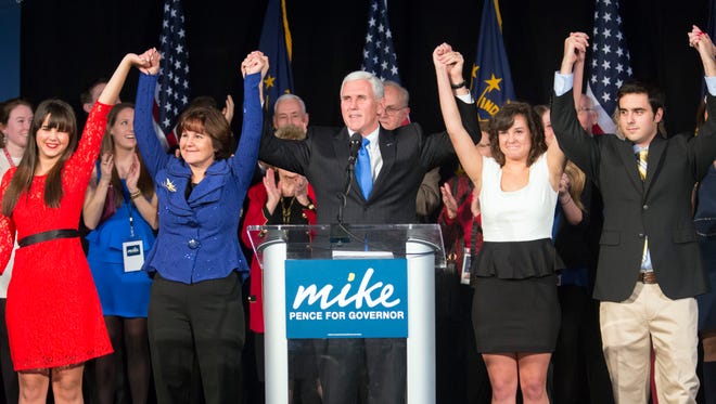 Republican governor-elect Mike Pence, middle, celebrates the victory with his family at Lucas Oil Stadium, Indianapolis, Ind., Tuesday, November 6, 2012. (Matt Dial / For The Star)