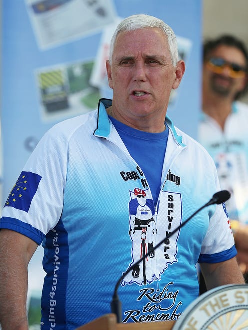 Gov. Mike Pence speaks before the start of the annual Cops Cycling for Survivors' 13-day ride across Indiana. Riders gathered Monday, July 11, 2016, at the Indiana State Museum in Downtown Indianapolis. Pence and his wife, Karen, rode the first leg.