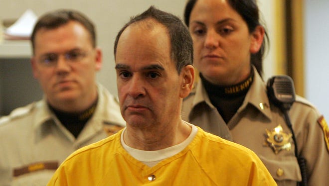 Anthony Appolonia, who killed 19 cats, enters Judge Edward M. Neafsey's courtroom for sentencing at Monmouth County Courthouse in New Jersey in 2008.