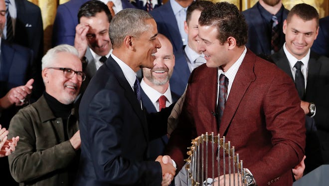 President Obama shakes hands with Cubs 1B Anthony Rizzo during a ceremony in the East Room of the White House.