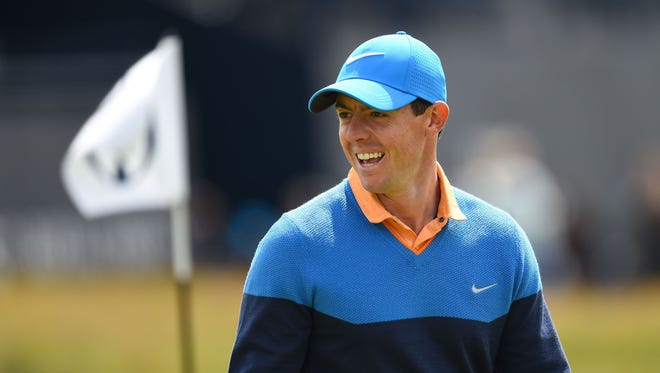 In a file photo from July 12, 2016, Rory McIlroy reacts during a practice round for the 145th Open Championship golf tournament at Royal Troon Golf Club - Old Course.