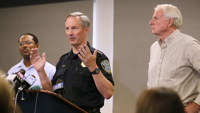 Milwaukee police Chief Edward Flynn takes questions Sunday, Aug. 14, 2016, about the violence stemming from the police officer-involved shooting Saturday, Aug. 13, 2016. Milwaukee Common Council President Ashanti Hamilton, left, and Milwaukee Mayor Tom Barrett also participated.