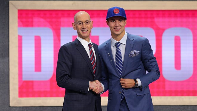 Luke Kennard (Duke) is introduced by NBA commissioner Adam Silver as the No. 12 overall pick.