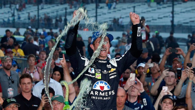 Kasey Kahne celebrates after winning Sunday's Brickyard 400 at Indianapolis Motor Speedway.