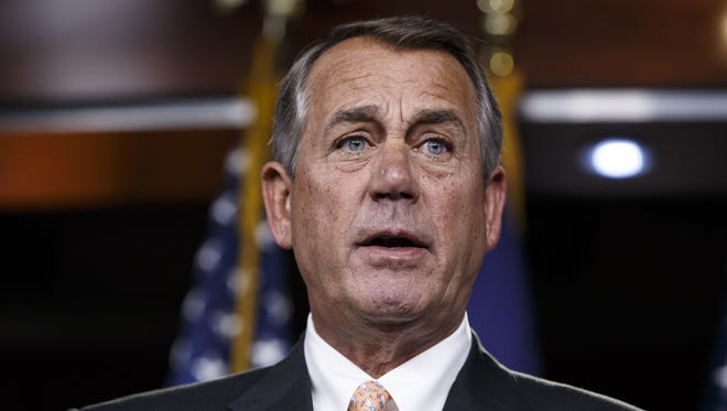 In this Feb. 26, 2015, file photo, then-speaker John Boehner speaks on Capitol Hill.