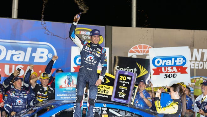 Kasey Kahne celebrates winning the Oral-B USA 500 at Atlanta Motor Speedway on Aug. 31, 2014. Kahne clinched a berth in the Chase with the victory.