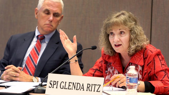 Gov. Mike Pence and Superintendent of Public Instruction Glenda Ritz lead the Indiana Education Roundtable meeting at the Indiana Government Center in Indianapolis on Monday, June 23, 2014.