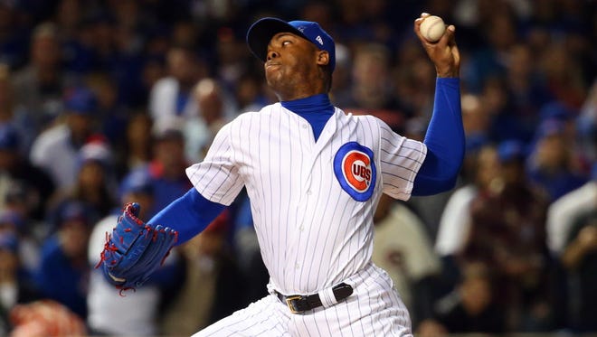 Game 6 in Chicago: Cubs relief pitcher Aroldis Chapman throws during the eighth inning.