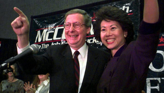 Kentucky Sen. Mitch McConnell and his wife Elaine Chao attend his victory celebration Nov. 5, 1996, in Louisville.