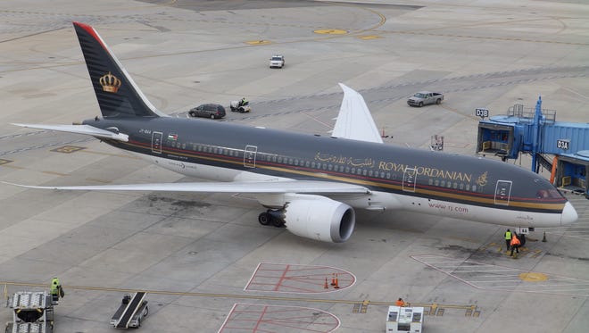 A Royal Jordanian Boeing 787 aircraft pulls up to a gate at Detroit on Dec. 1, 2014. Royal Jordanian became the first airline to begin flying the Dreamliner to Detroit.