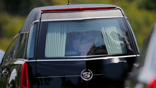 The hearse returns Bobbi Kristina's casket to the funeral home. She is expected to be interred alongside her mother Monday in New Jersey.
