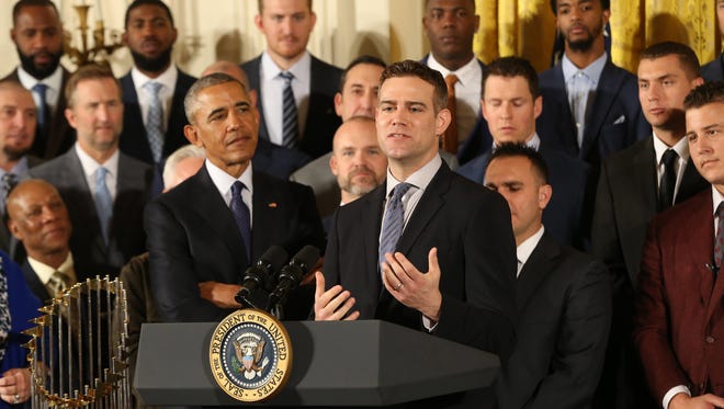 Cubs team president Theo Epstein speaks as President Obama listens at a ceremony honoring the 2016 World Series Champion Cubs.