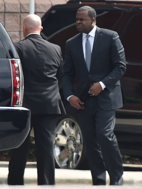 Atlanta mayor Kasim Reed heads into the church to pay his respects.