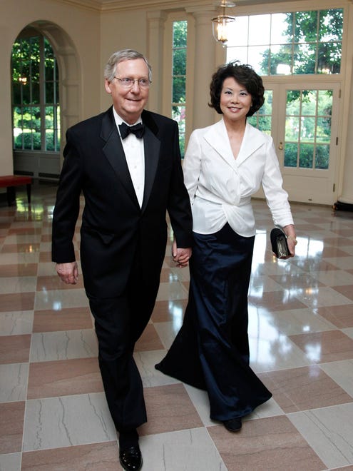 Sen. Mitch McConnell and Elaine Chao arrive for a state dinner hosted by President Obama and first lady Michelle Obama in honor of German Chancellor Angela Merkel at the White House on June 7, 2011.