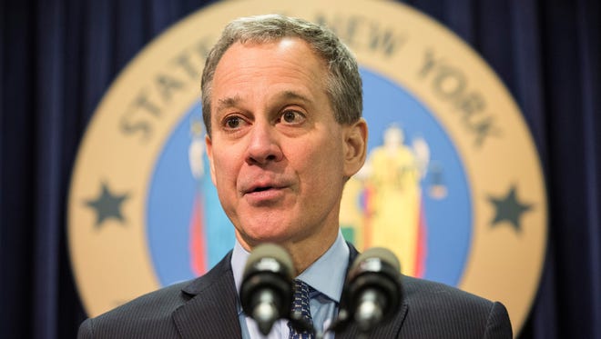 File photo taken in 2015 shows New York  Attorney General Eric Schneiderman  at a press conference announcing new guidelines and testing standards that GNC will use for its herbal supplements and extracts.