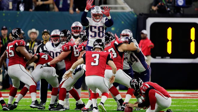 Shea McClellin #58 of the New England Patriots attempts to block a point after try in the second quarter against the Atlanta Falcons during Super Bowl 51 at NRG Stadium on February 5, 2017 in Houston, Texas.