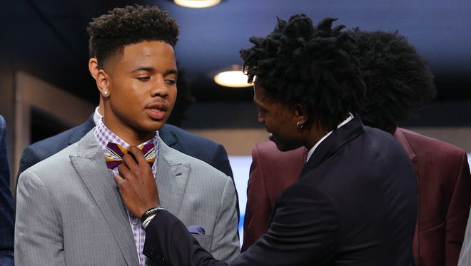 De'Aaron Fox, right, helps Markelle Fultz with his bow tie before the first round of the 2017 NBA draft at Barclays Center.