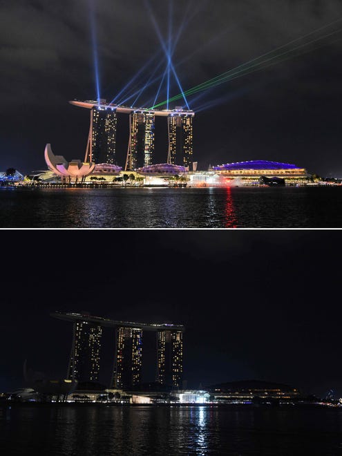 The Marina Bay Sands hotel and resort in Singapore is shown in this before and after Earth Hour combination of images.