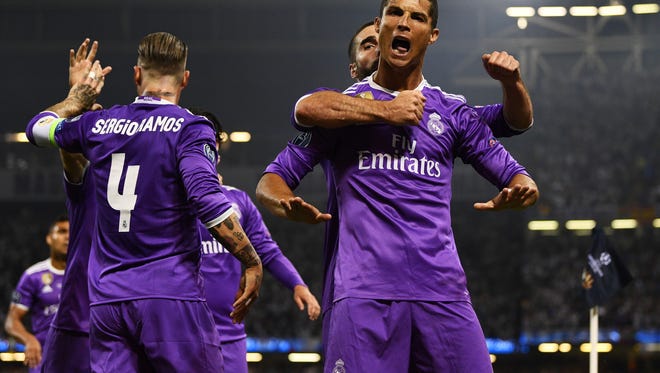 Cristiano Ronaldo celebrates scoring the opener.