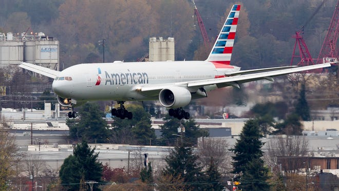 An American Airlines Boeing 777-200, operating a charter flight, lands at Boeing Field in Seattle on Nov. 20, 2016.