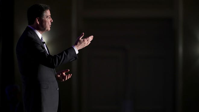 James Comey delivers the keynote remarks at the Intelligence and National Security Alliance Leadership Dinner March 29, 2017, in Alexandria, Va.