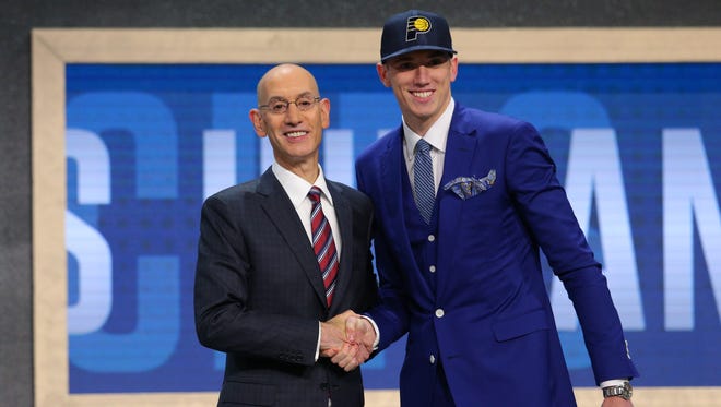 T.J. Leaf (UCLA) is introduced by NBA commissioner Adam Silver as the No. 18 overall pick.