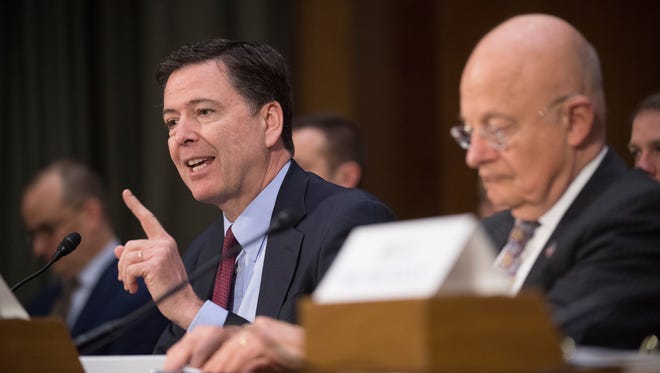 James Comey, left, and James Clapper, Director of the National Intelligence, during hearing regarding Assessment of Russian Activities and Intentions in Recent U.S. Elections before the Senate Intelligence Committee on Jan 10, 2017 in Washington.