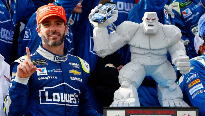 June 4: Jimmie Johnson wins the AAA 400 at Dover International Speedway.