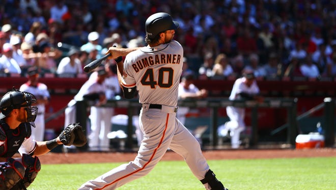 April 2: Giants pitcher Madison Bumgarner hits not one, but two homers on opening day. The first came in the fifth inning against the Diamondbacks.