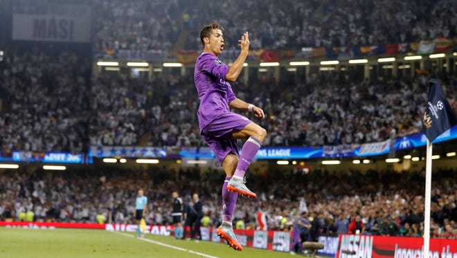 Real Madrid's Cristiano Ronaldo celebrates after scoring the opening goal.