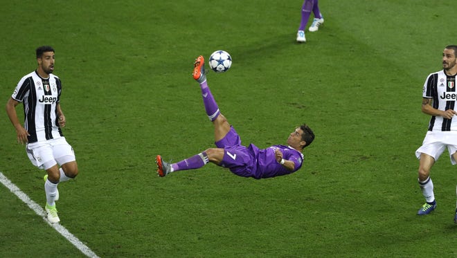 Real Madrid's Cristiano Ronaldo tries a bicycle kick.