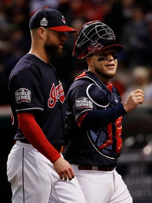 Corey Kluber (L) provided the pitching and Roberto Perez (R) provided the power in Game 1.