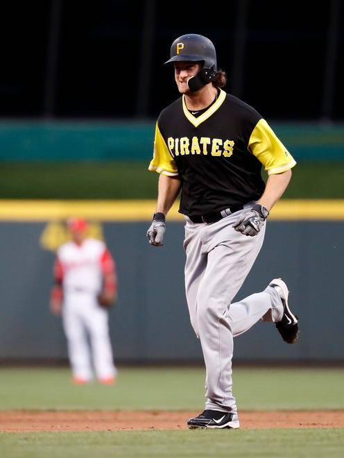 Aug. 26: Pirates' Gerrit Cole runs the bases after hitting a solo home run off Reds starting pitcher Luis Castillo.