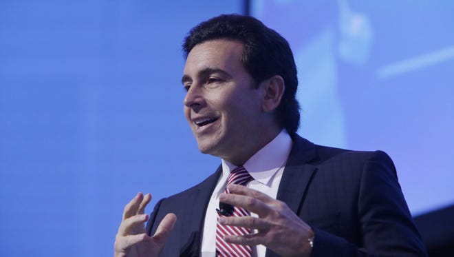 Ford CEO Mark Fields speaks at Ford Design Center in the Product Development Center in Dearborn on Thursday, December 10, 2015.