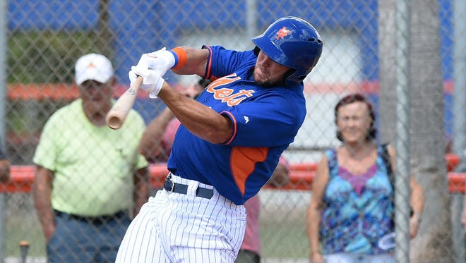 Tim Tebow hits a home run in his first at-bat.