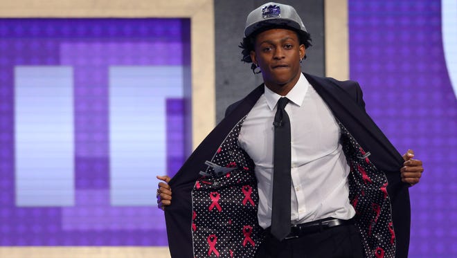 De'Aaron Fox shows off the inside of his suit after being drafted as the No. 5 overall pick in the 2017 NBA draft at Barclays Center.