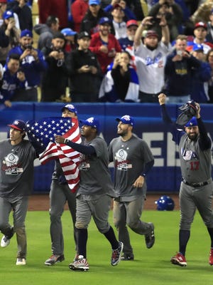 Team USA celebrates its title-game conquest of Puerto Rico at Dodger Stadium.