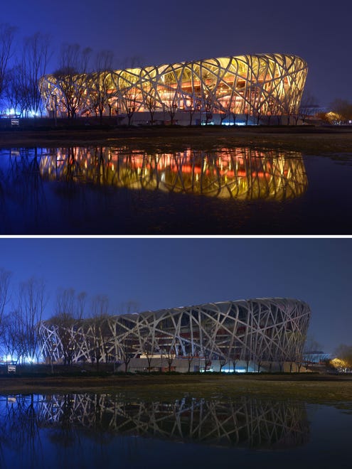 This combination of photographs shows China's National Stadium, known as the Bird's Nest, with the lights on and with the lights off during the annual Earth Hour event in Beijing, Saturday.  Millions of people were expected to switch off their lights for Earth Hour, in a global effort to raise awareness about climate change that was even to be monitored from space.