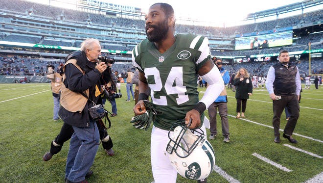 New York Jets corner back Darrelle Revis (24) runs off the field after a game against the Buffalo Bills at MetLife Stadium.