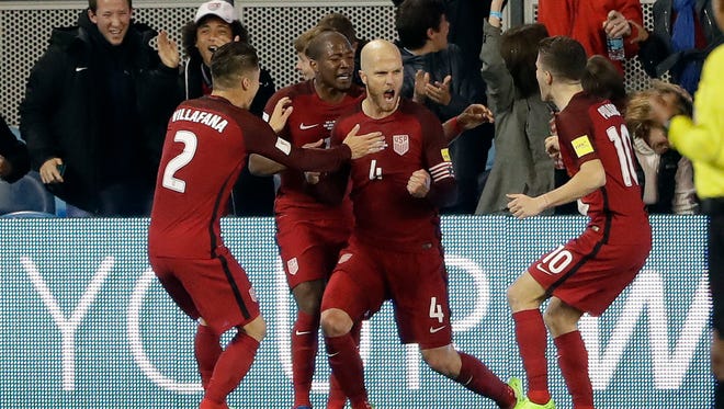 United States' Michael Bradley (4) celebrates his goal during the first half of a World Cup qualifying soccer match against Honduras.