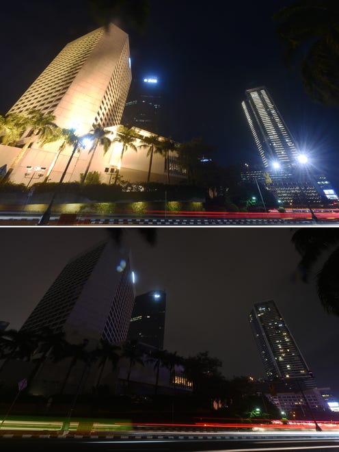 This combination photograph shows  buildings in Jakarta's business district, with the lights on and off during the annual Earth Hour event.