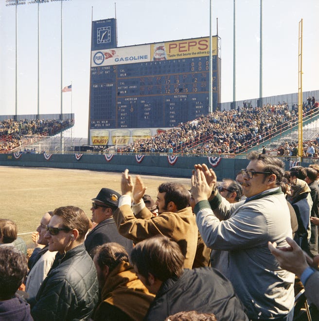 Fans in right field cheer during the Brewers' first opening day on April 7, 1970. The game was also the season opener for the Brewers. A crowd of 37,237 saw the Brewers fall to the California Angels 12-0.