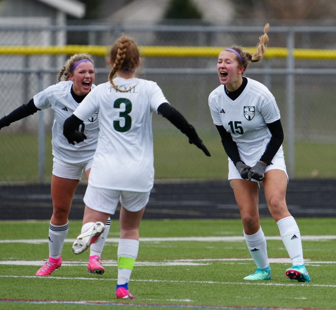 Kettle Moraine Lutheran's Maddie Leffel (15) reacts after scoring on a free kick in the match at Waukesha West on Saturday, March 30, 2024.