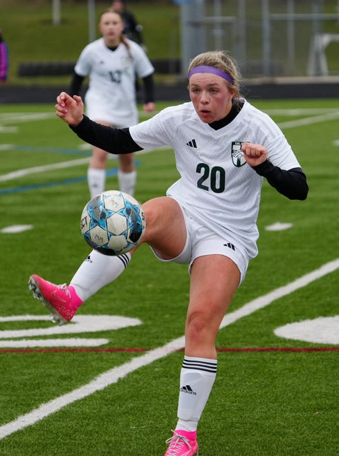 Kettle Moraine Lutheran's Ava Collyard (20) sends the ball downfield during the match at Waukesha West on Saturday, March 30, 2024.