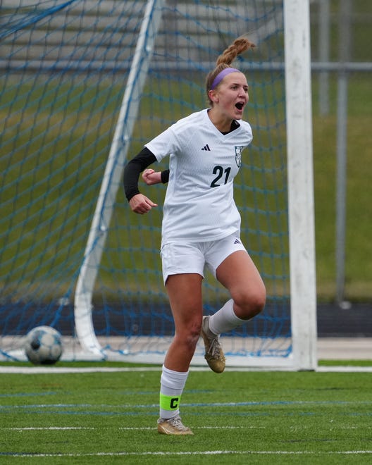 Kettle Moraine Lutheran's Ava Zarling (21) reacts after scoring in the 79th minute of the match at Waukesha West on Saturday, March 30, 2024. Kettle Moraine Lutheran won 4-2.
