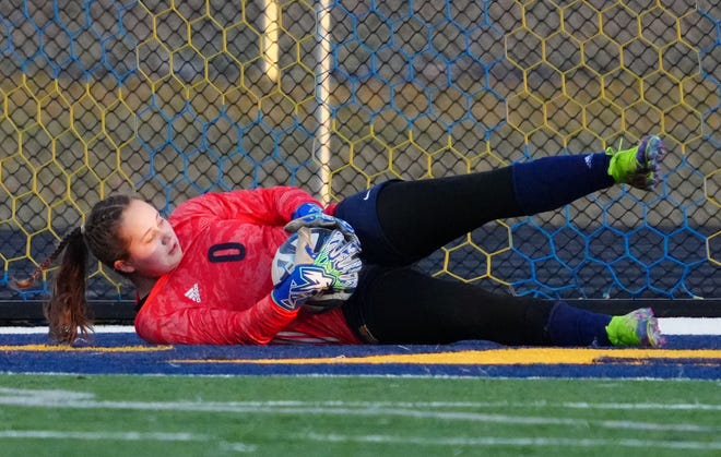Brookfield Academy keeper Isabella Schneck (0) makes a save during the match at Kettle Moraine on Friday, April 5, 2024.