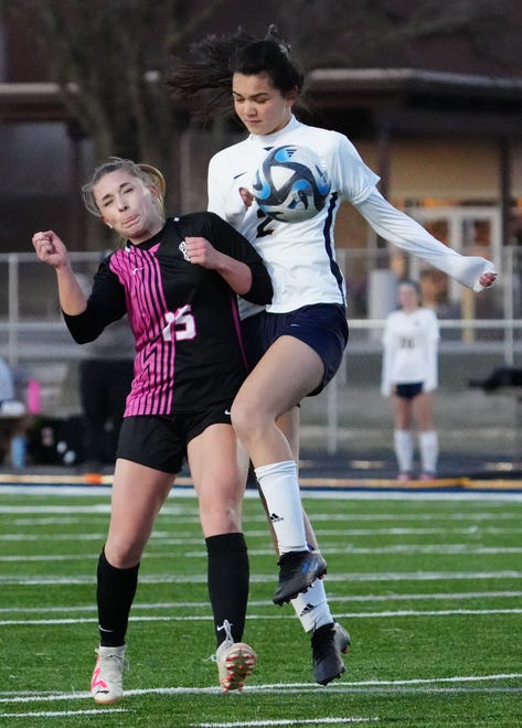 Kettle Moraine's Kendal Moore (15) battles Brookfield Academy's Patricia Weiss (2) during the match at Kettle Moraine on Friday, April 5, 2024.