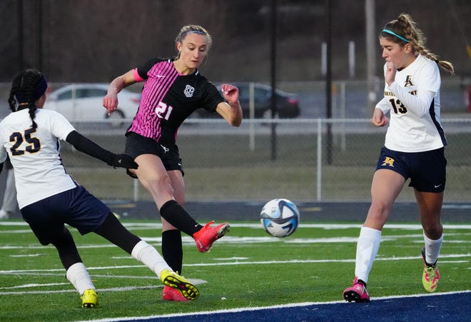 Kettle Moraine's Eiley Henderson (21) takes a shot on goal during the match at home against Brookfield Academy on Friday, April 5, 2024. Henderson scored 3 goals in Kettle Moraine's 6-0 victory.
