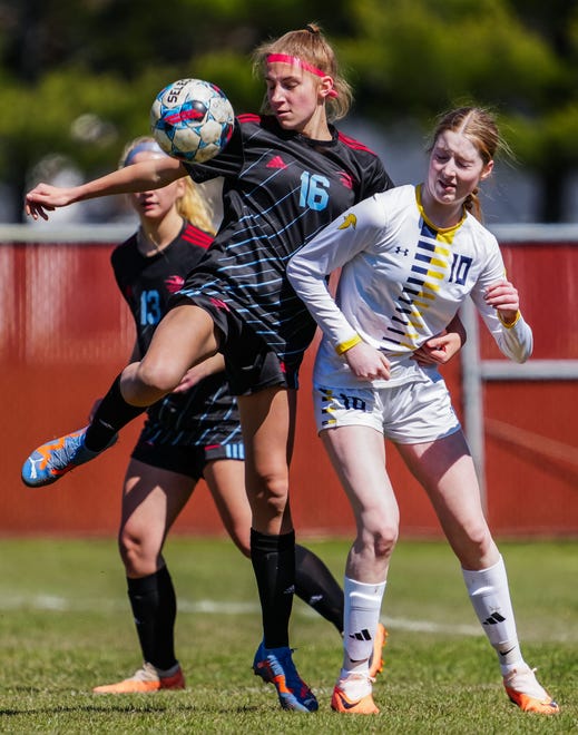 Arrowhead's Audrey Willoughby (16) battles for possession with Whitnall's Emily Teixeira (10) during the match at Arrowhead on Saturday, April 6, 2024.